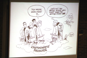 A political cartoon from Khalil Bendib's website displayed at the Nous Sommes Tous Charlie symposium on Jan. 3. Photo cred: Olivia Paggiarino 